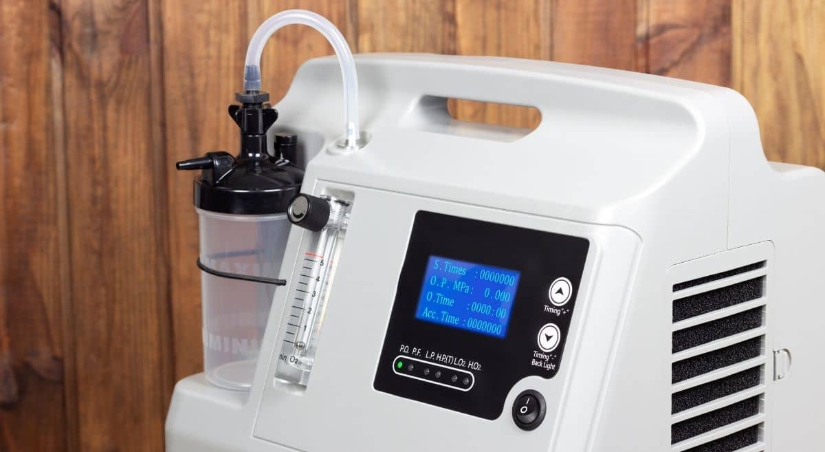 portable oxygen concentrator or oxygen generator by Nikolay Ponomarenko from Getty Images